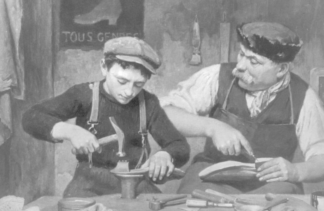 A shoemaker and his apprentice working